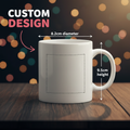 White mug with dimensions on a wooden surface and colorful blurred lights in the background